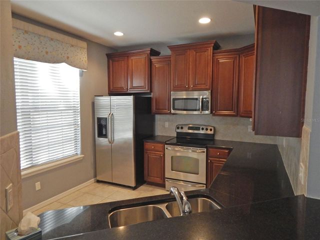 16411 KINGLETRIDGE AVENUE, Lithia, FL 33547