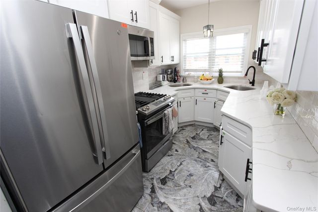 14436 77th Avenue, Kew Garden Hills, NY 11367