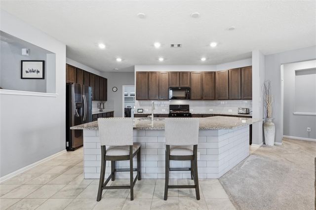 3912 Eagle Nest Lake Lane, Magnolia, TX 77354