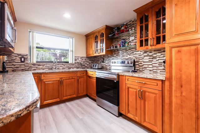8973 Palm Tree Lane, Pembroke Pines, FL 33024