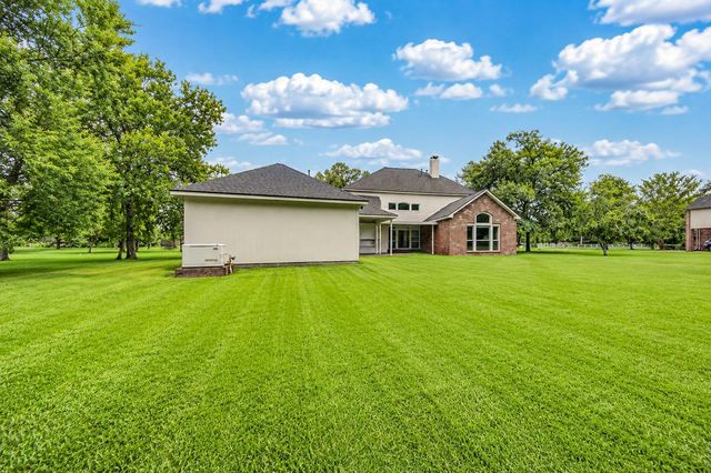 7110 Rustling Oaks Drive, Richmond, TX 77469