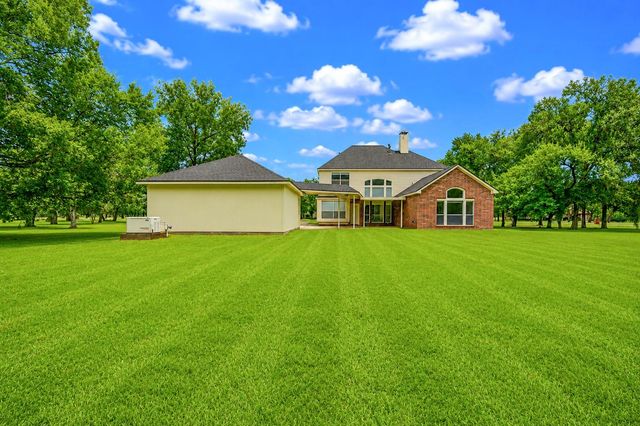 7110 Rustling Oaks Drive, Richmond, TX 77469