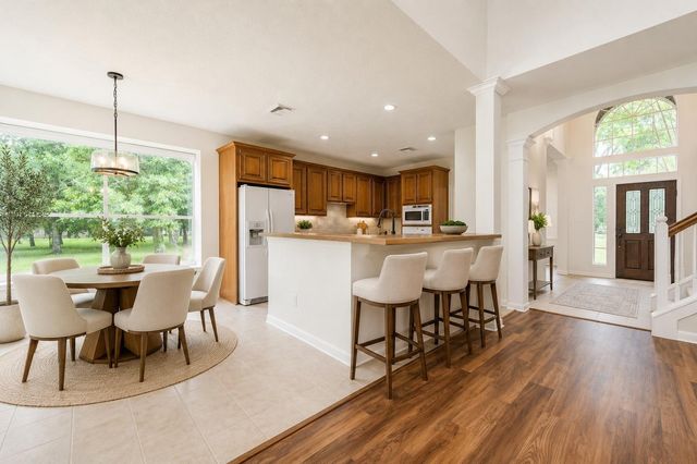 7110 Rustling Oaks Drive, Richmond, TX 77469