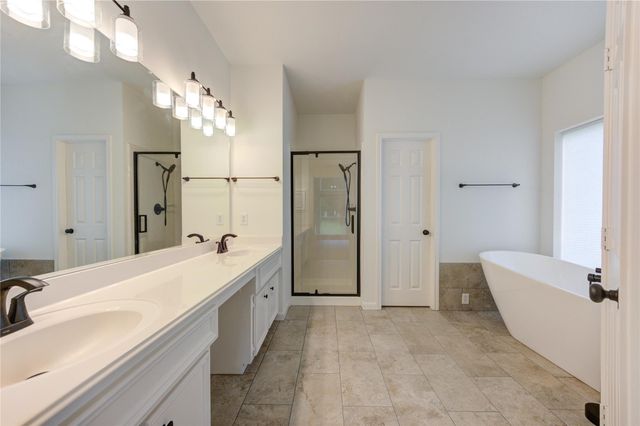 7110 Rustling Oaks Drive, Richmond, TX 77469