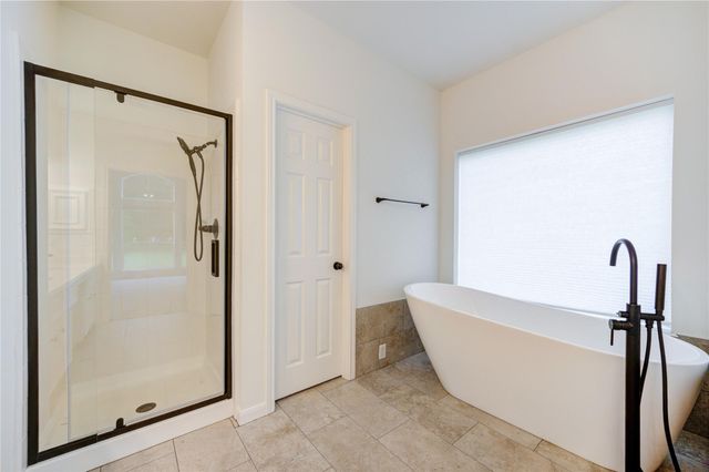 7110 Rustling Oaks Drive, Richmond, TX 77469