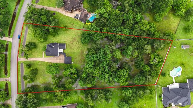 7110 Rustling Oaks Drive, Richmond, TX 77469