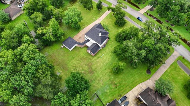 7110 Rustling Oaks Drive, Richmond, TX 77469