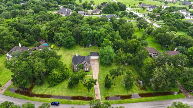 7110 Rustling Oaks Drive, Richmond, TX 77469
