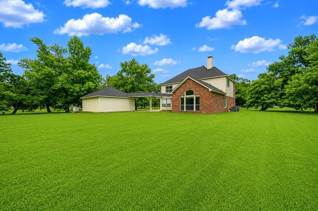 7110 Rustling Oaks Drive, Richmond, TX 77469