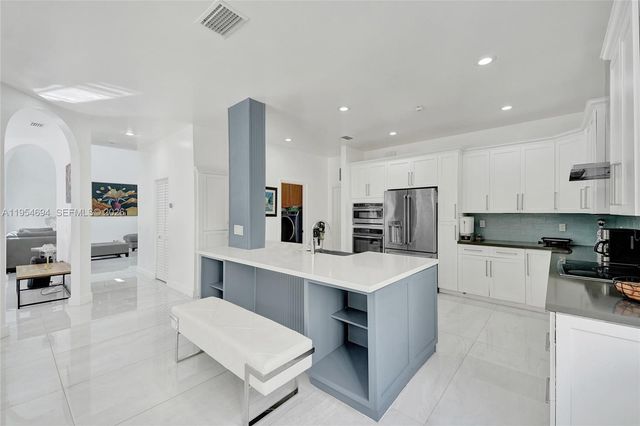 1367 Camellia Cir, Weston, FL 33326