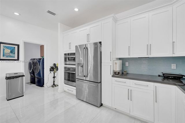 1367 Camellia Cir, Weston, FL 33326