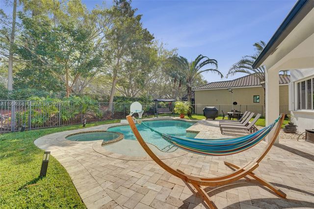 1367 Camellia Cir, Weston, FL 33326