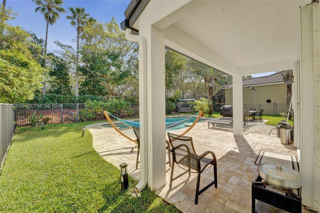 1367 Camellia Cir, Weston, FL 33326