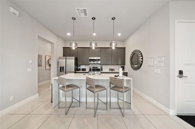 7740 SANDY RIDGE DRIVE 131, Reunion, FL 34747