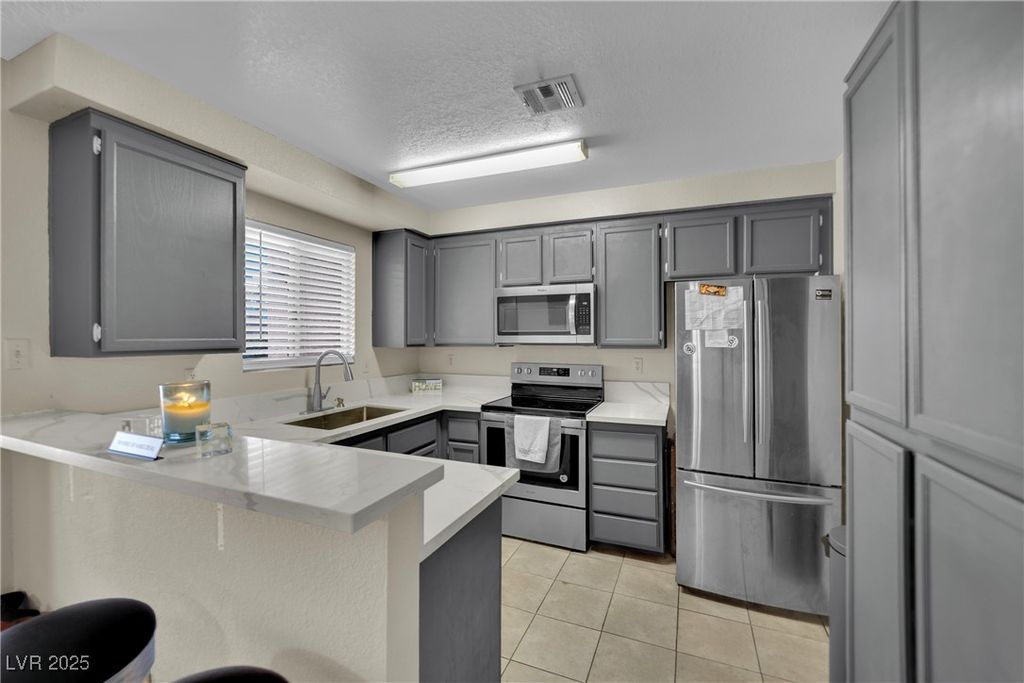 Image 2 of property listing at 6881 Tamarus Street 202, Las Vegas, NV 89119