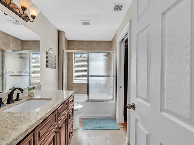 1581 Winterberry Ln, Weston, FL 33327