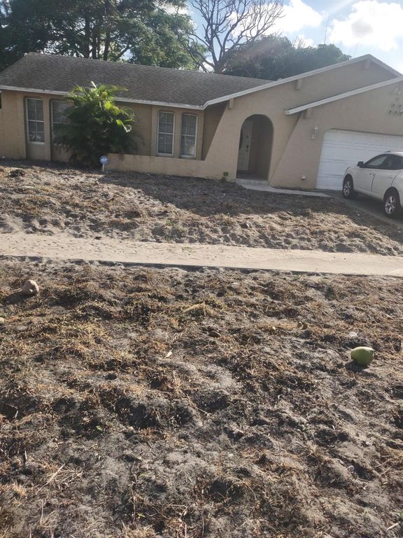 1486 Woodcrest Road N, West Palm Beach, FL 33417