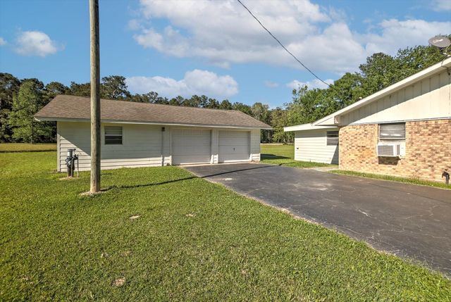 411 County Road 2298, Cleveland, TX 77327