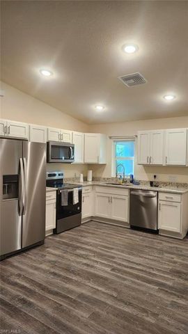 575 Oakshire LN, Lehigh Acres, FL 33972