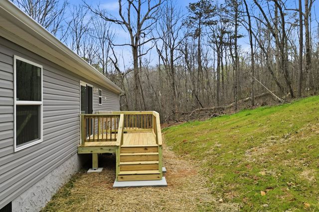240 Cherokee Wood Hollow Drive, Ball Ground, GA 30107