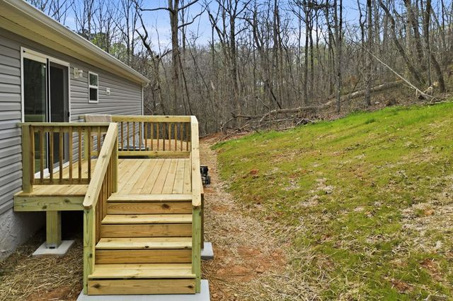 240 Cherokee Wood Hollow Drive, Ball Ground, GA 30107