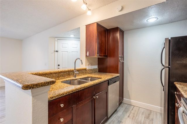 5156 CONROY ROAD 16, Orlando, FL 32811