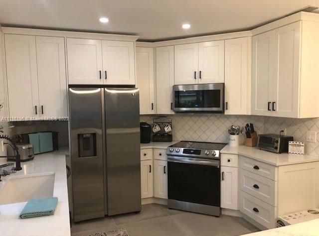 1143 Duncan Cir 104, Palm Beach Gardens, FL 33418