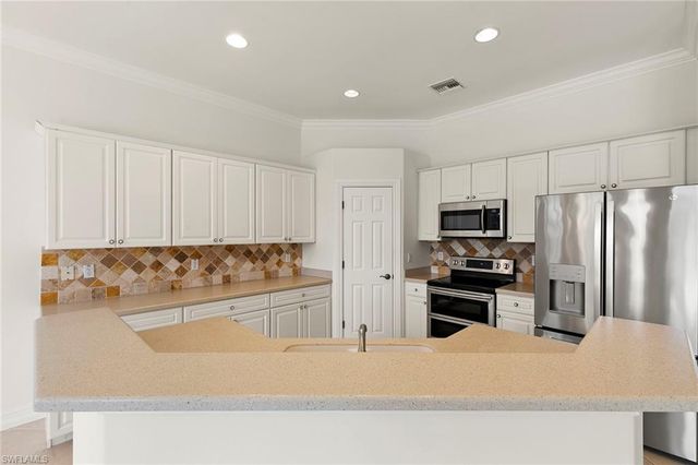 6920 Bent Grass DR, Naples, FL 34113