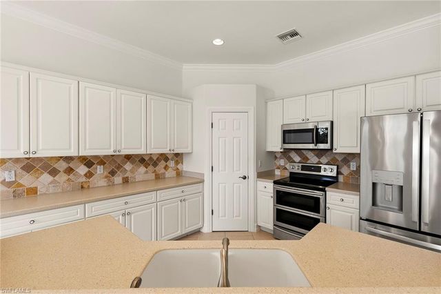 6920 Bent Grass DR, Naples, FL 34113