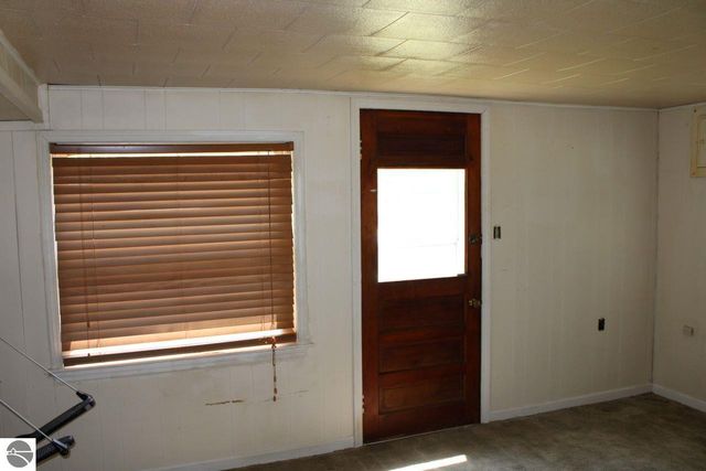 8807 NE Starvation Lake Road, Mancelona, MI 49659