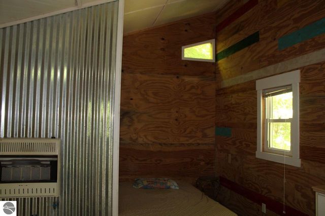 8807 NE Starvation Lake Road, Mancelona, MI 49659