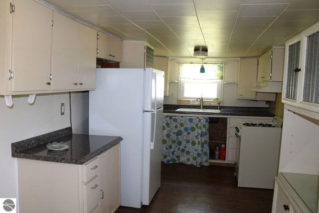 8807 NE Starvation Lake Road, Mancelona, MI 49659