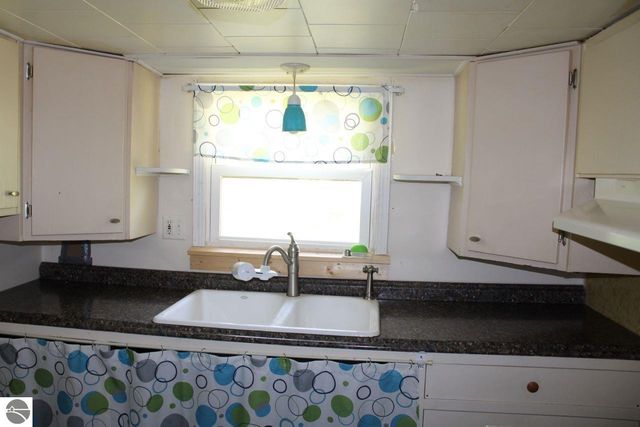 8807 NE Starvation Lake Road, Mancelona, MI 49659