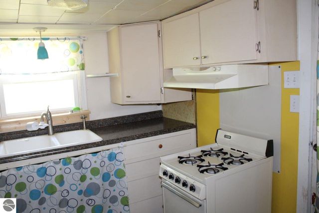 8807 NE Starvation Lake Road, Mancelona, MI 49659