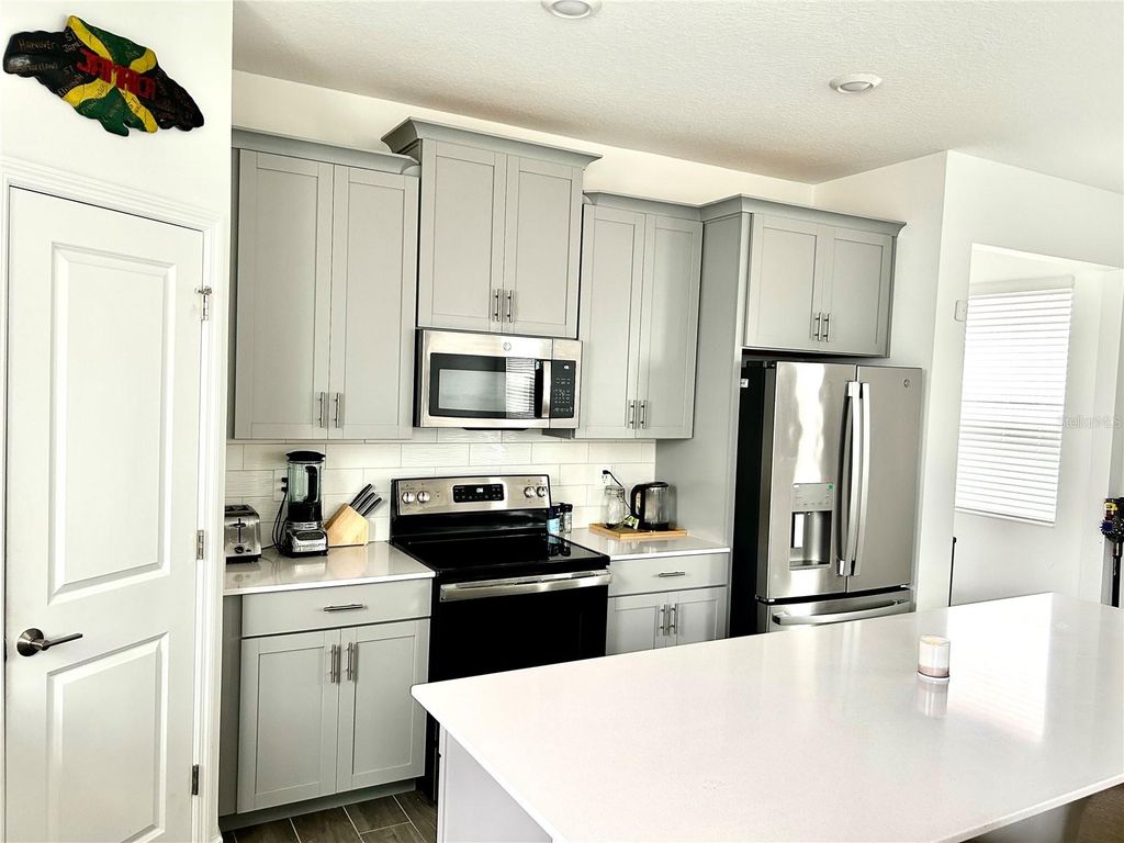 Image 7 of property listing at 9787 INTRODUCTION WAY, Orlando, FL 32832