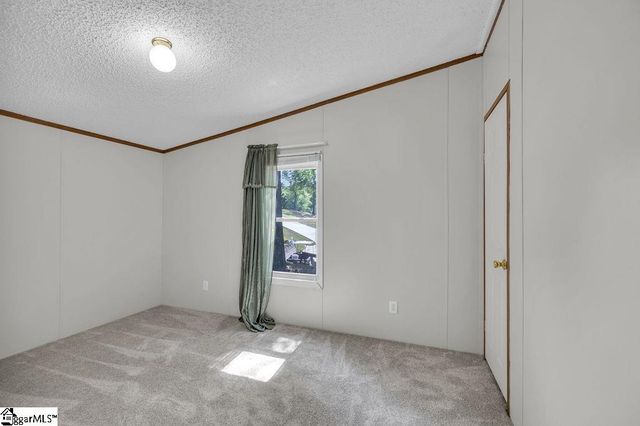 90 E Stagecoach Road, Cross Hill, SC 29332