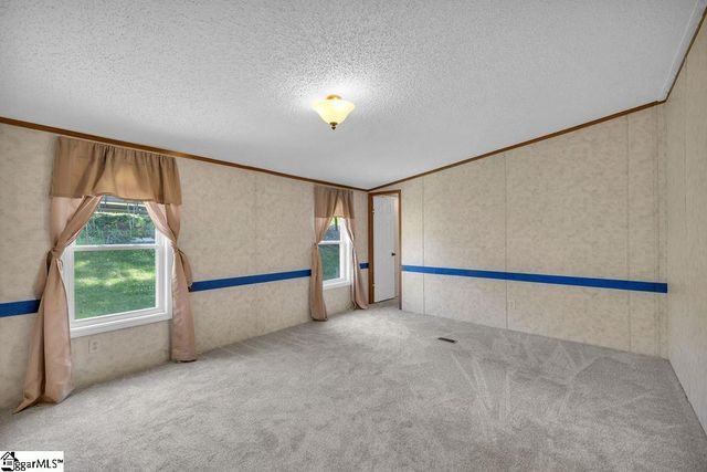 90 E Stagecoach Road, Cross Hill, SC 29332