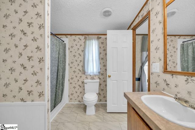 90 E Stagecoach Road, Cross Hill, SC 29332
