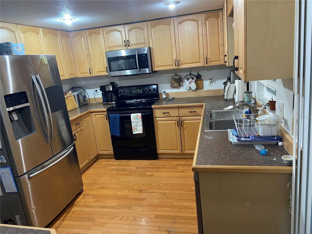 Image 2 of property listing at 1116 E OAKWOOD STREET, Tarpon Springs, FL 34689