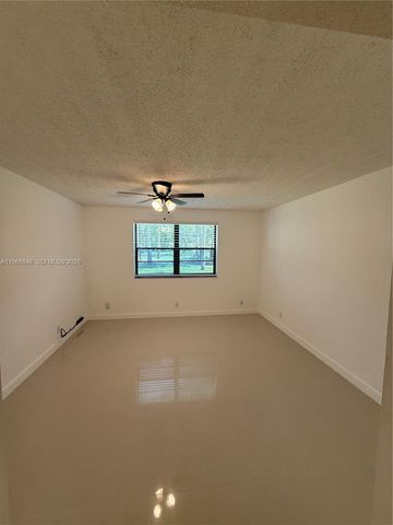 6095 N Sabal Palm Boulevard 103, Tamarac, FL 33319