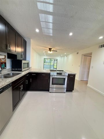 6095 N Sabal Palm Boulevard 103, Tamarac, FL 33319