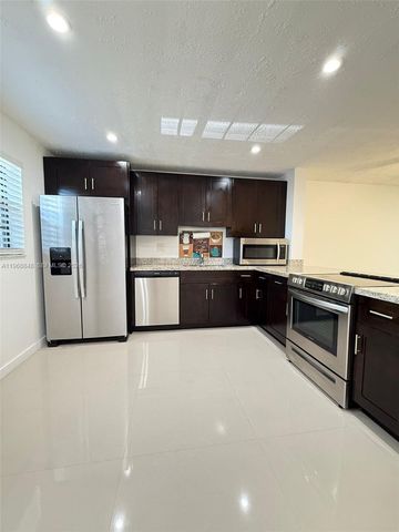 6095 N Sabal Palm Boulevard 103, Tamarac, FL 33319