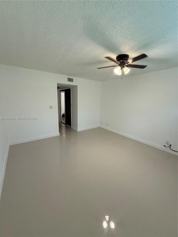 6095 N Sabal Palm Boulevard 103, Tamarac, FL 33319