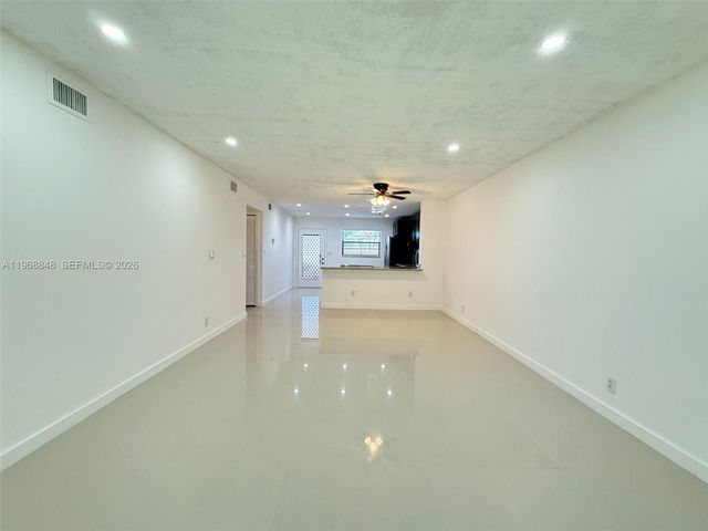 6095 N Sabal Palm Boulevard 103, Tamarac, FL 33319