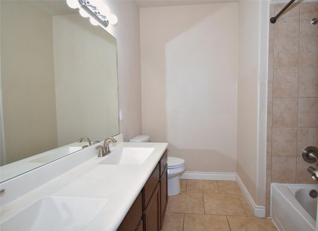 5623 S Denham Ridge Lane, Spring, TX 77389