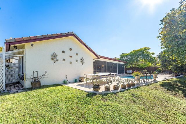 128 NW 110th Way, Coral Springs, FL 33071