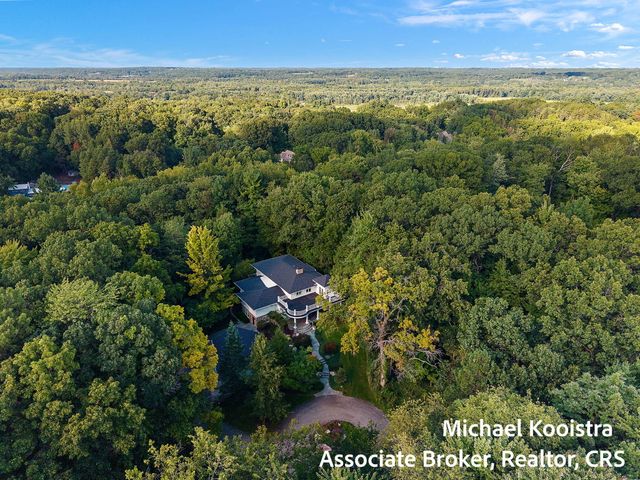 5760 Grand River Drive Ne, Ada Twp, MI 49301
