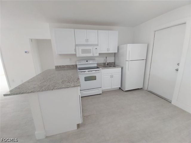 317 Tarpon DR, Cape Coral, FL 33904