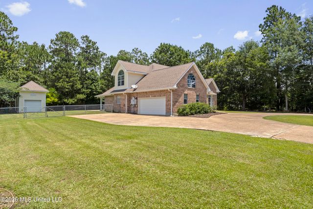 818 Rue De Lasalle Street, Waveland, MS 39576
