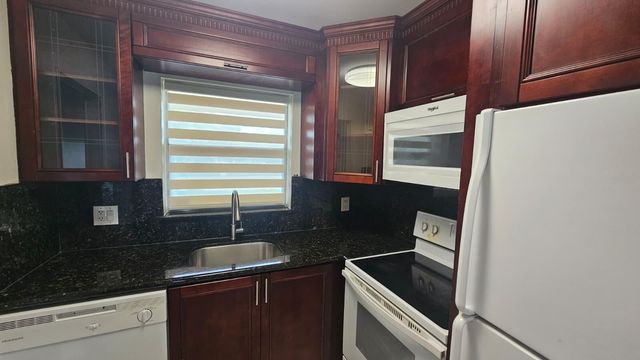 9911 Sandalfoot Boulevard 116, Boca Raton, FL 33428